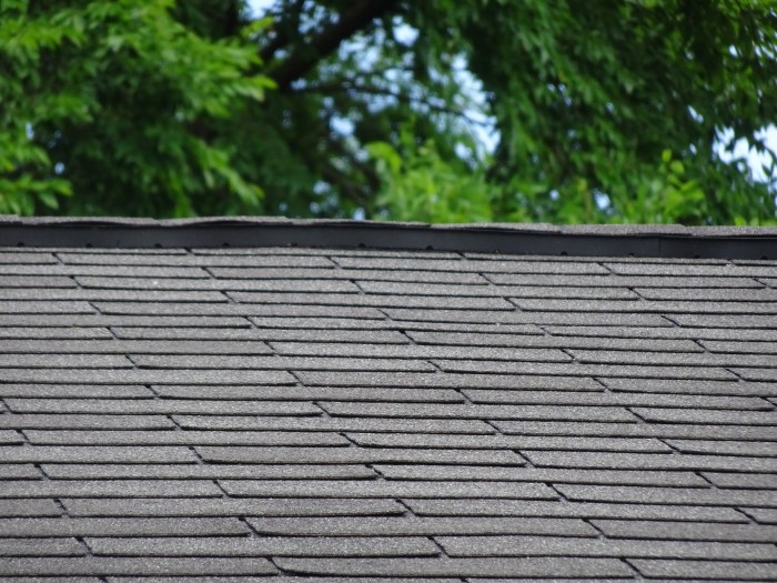 Metal roof to asphalt shingle transition