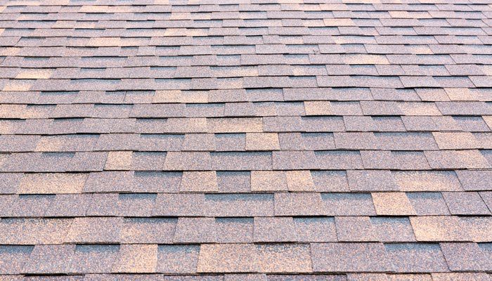 Rubberized asphalt shingles