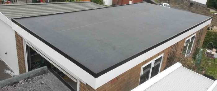 Flat rubber roof repair near me